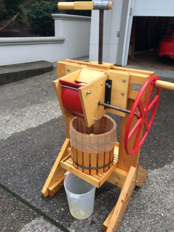 Hand operated cider press set up and ready to press