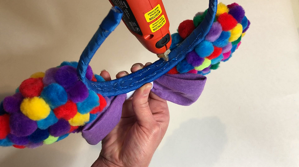 Add glue under headband to help grip DIY Balloon Ears Tutorial by Little Gray Squirrel