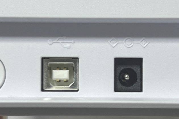 A picture of the USB port and the power port on a Silhouette machine