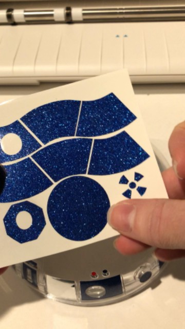 Stickers for the top of the littlebits Star Wars Droid cut out of blue glitter vinyl.